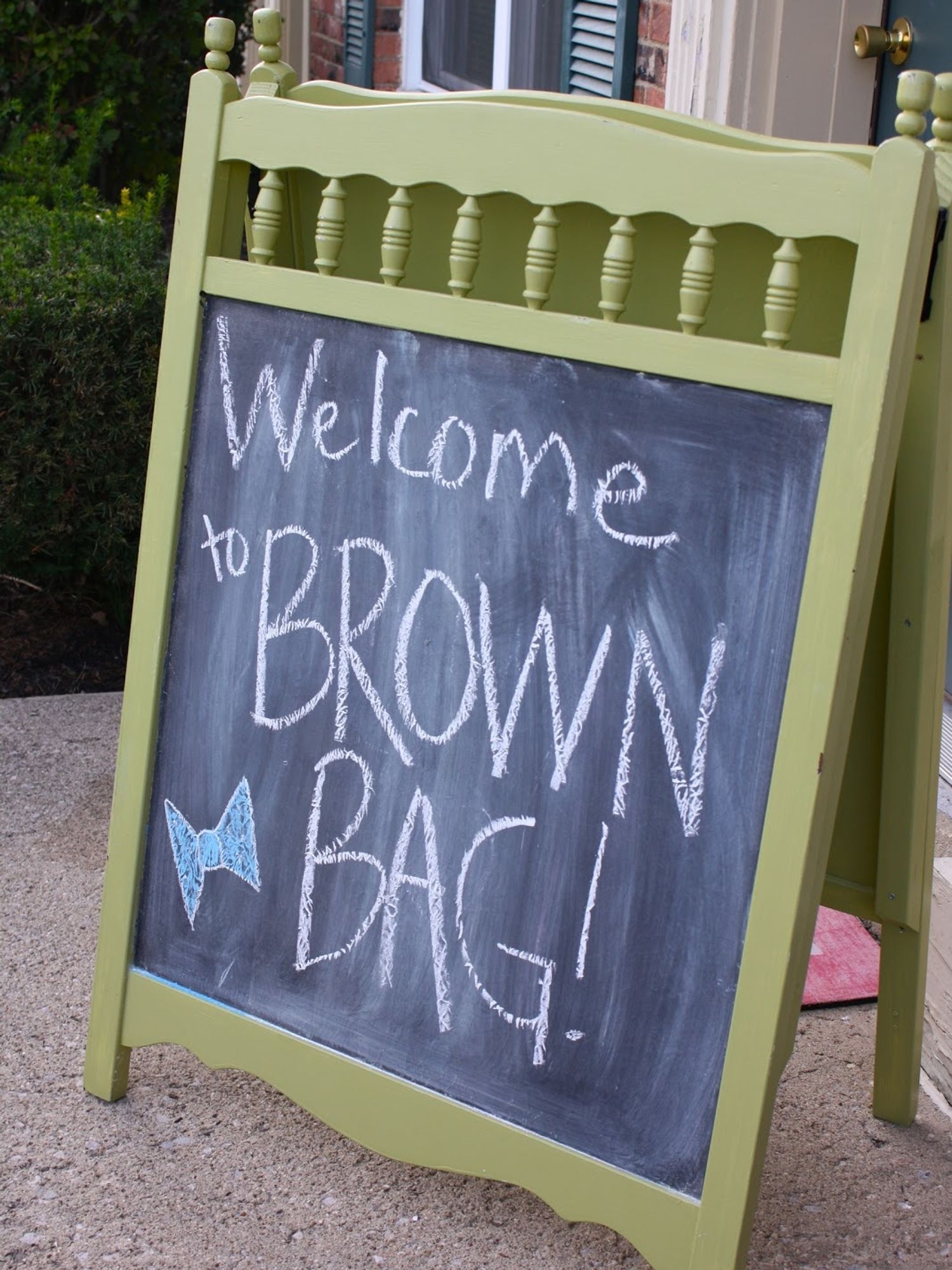 crib rails turned into a chalkboard easel